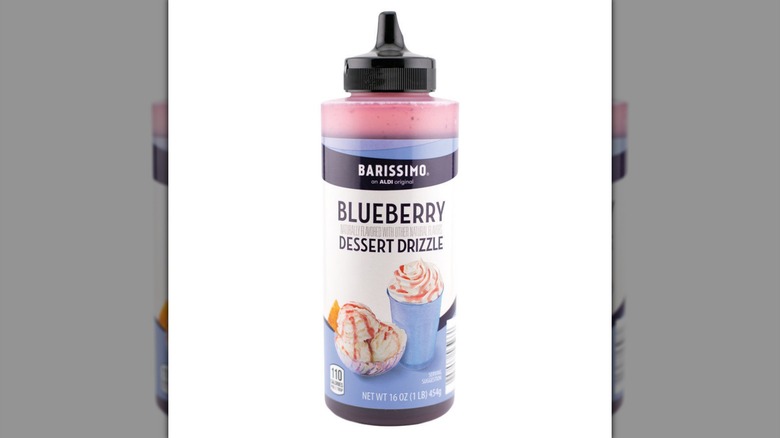 A bottle of Barissimo Blueberry Dessert Drizzle on a white background