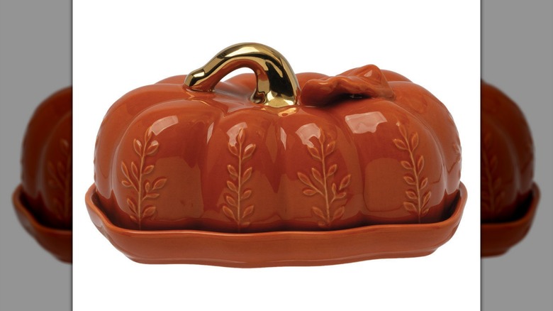 A Crofton Fall Ceramic pumpkin-shaped butter dish on a white background