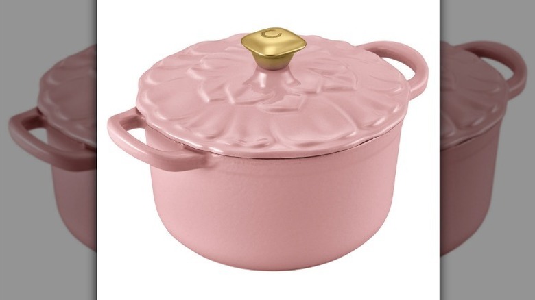 Cast iron dutch oven on white background