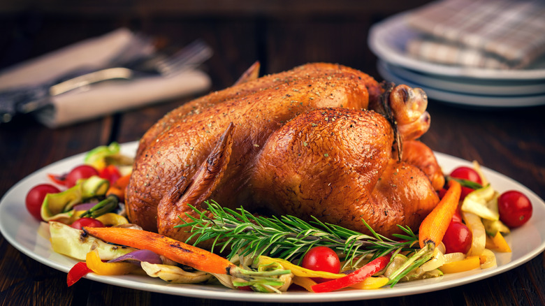 Whole roast turkey on platter