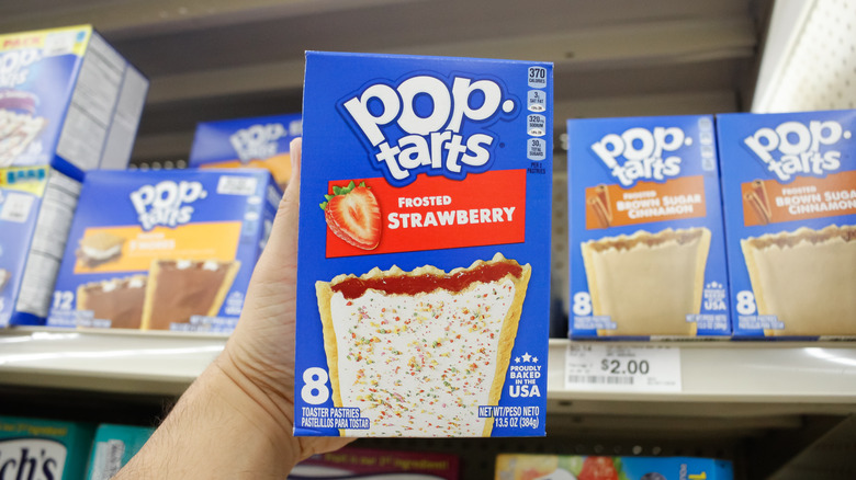 hand holding box of Pop-Tarts