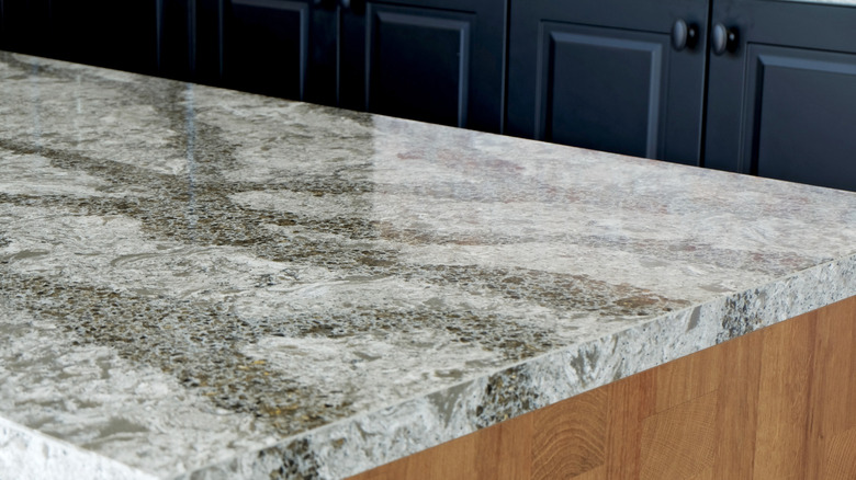 Close-up of a kitchen island with a quartz countertop