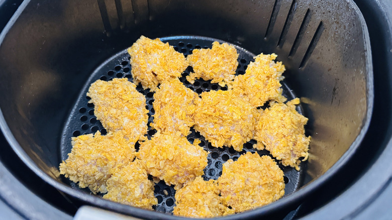 Popcorn chicken in air fryer basket