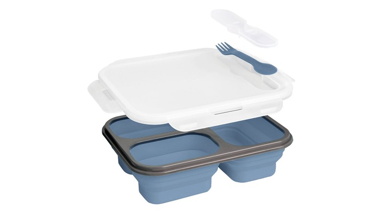 Blow-up view of the lunch container showing compartments, lid, and built in fork/spoon combination