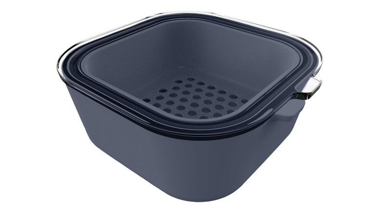 A square gray food storage container with clear plastic lid