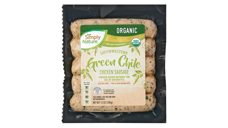 A vacuum-sealed bag of 5 Simply nature Organic Chicken Sausages, green chile flavor