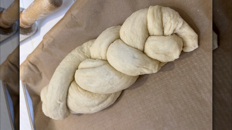 braided bread dough on paper