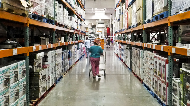 Person shopping in the kitchen section at Costco
