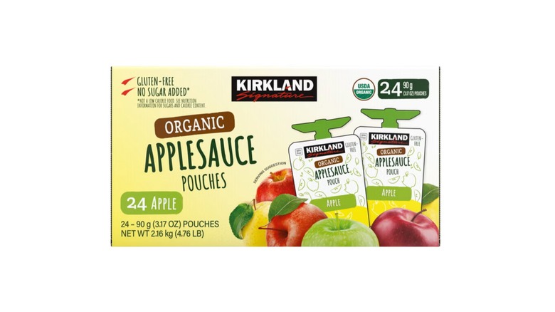 Box of applesauce pouches on white background