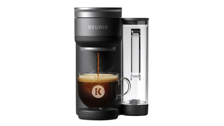 Keurig machine brewing coffee