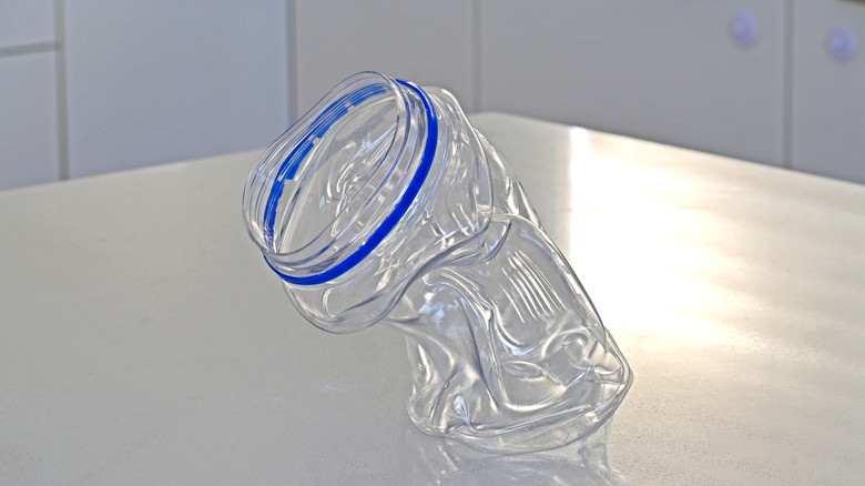 A melted plastic bottle on a table