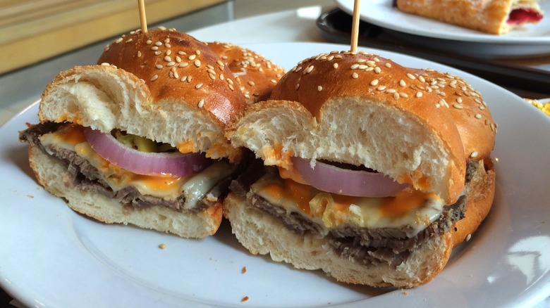 sandwich cut in half on a plate at Au Bon Pain