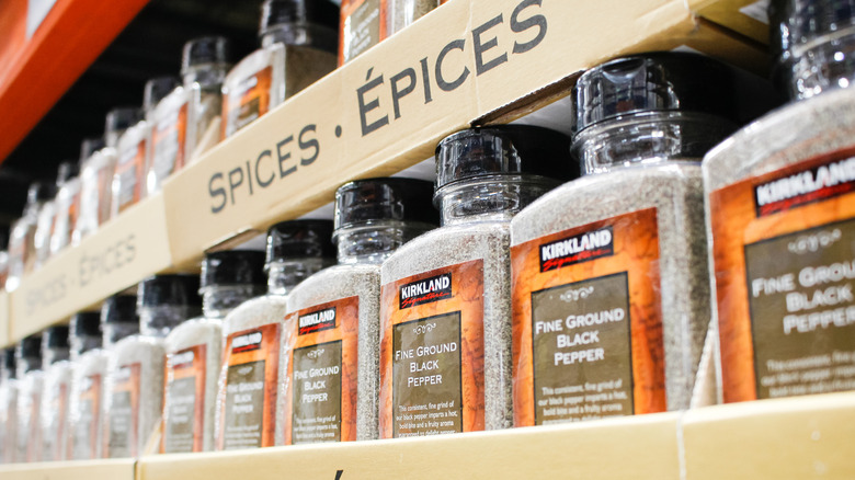 Containers of Kirkland Signature fine ground black pepper on display