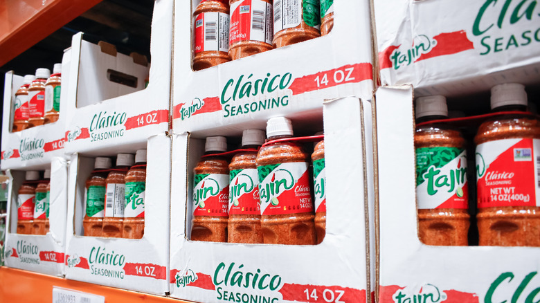 Containers of Tajin seasoning on store shelves