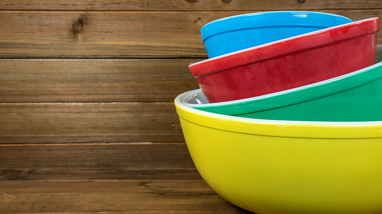 Multicolored stack of vintage Pyrex mixing bowls