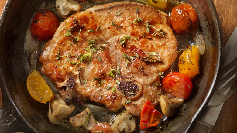 Pork sirloin chop with tomatoes