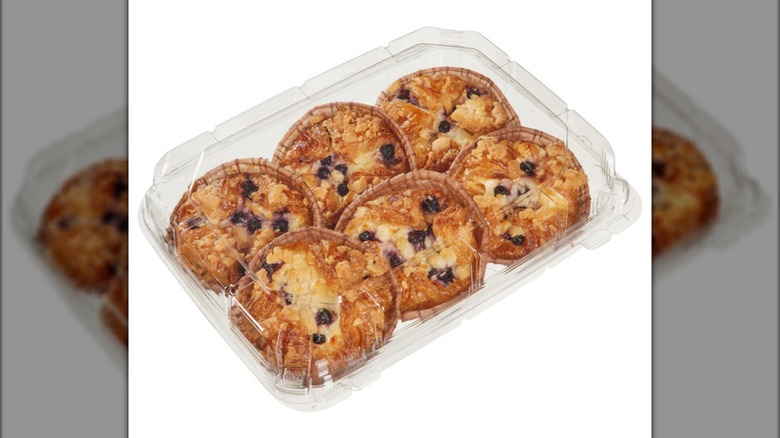 Blueberry Caramelized Cheesecake Croissants in a plastic clamshell