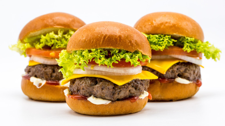 Three sliders on a white table