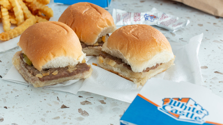Three sliders from White Castle on a marble table