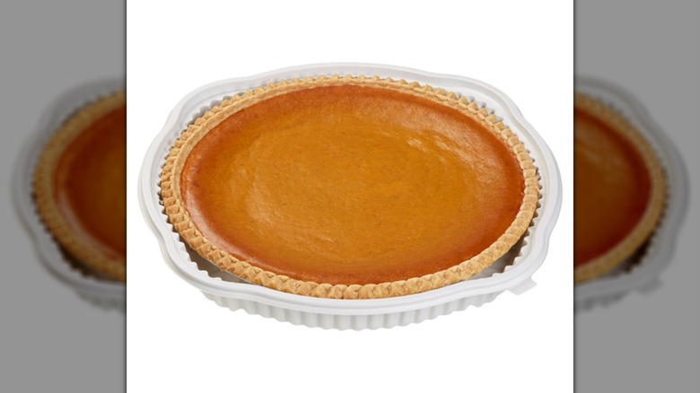 A Kirkland Signature Pumpkin Pie on a white background