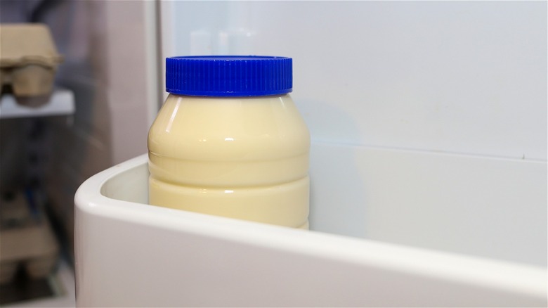 Mayonnaise container in fridge