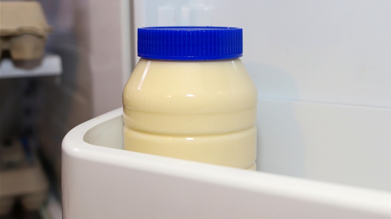 Mayonnaise container in fridge