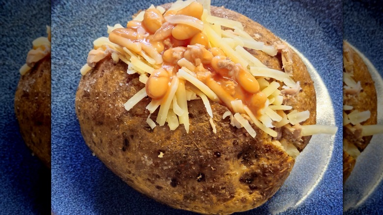Baked potato with tuna, cheese, and beans