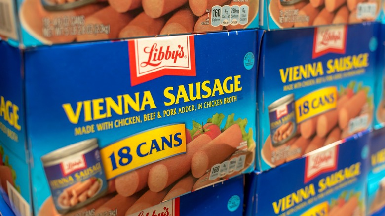 stacked cases of vienna sausage cans