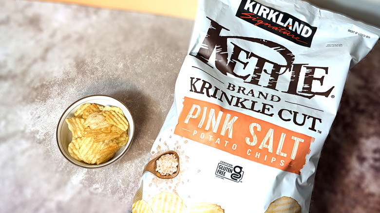 bag and bowl of Kirkland pink salt potato chips