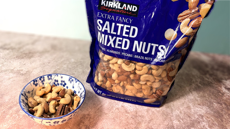 bag and bowl of Kirkland extra fancy salted mixed nuts