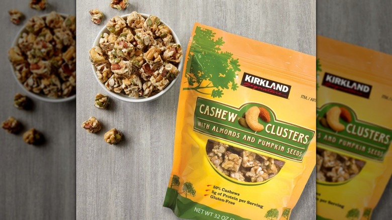 Cashew Clusters in a bowl next to bag