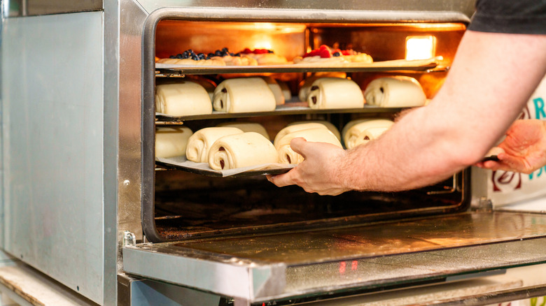 Loading a toaster oven with many raw pastries