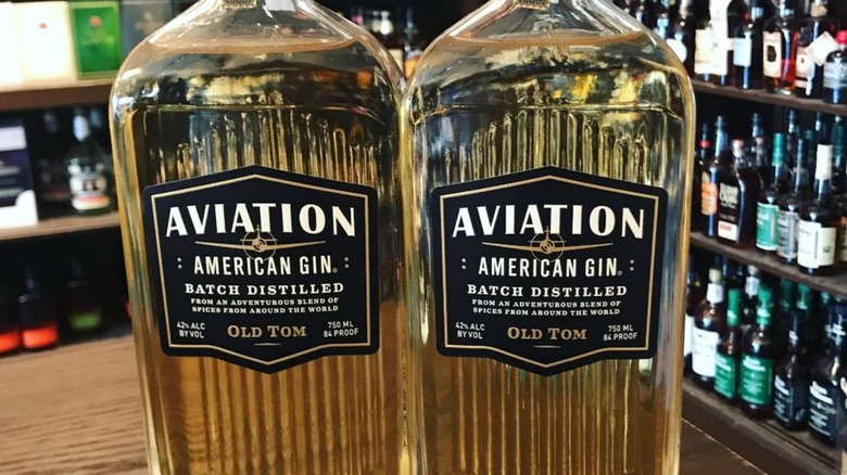 two bottles of aviation old tom gin in liquor shop