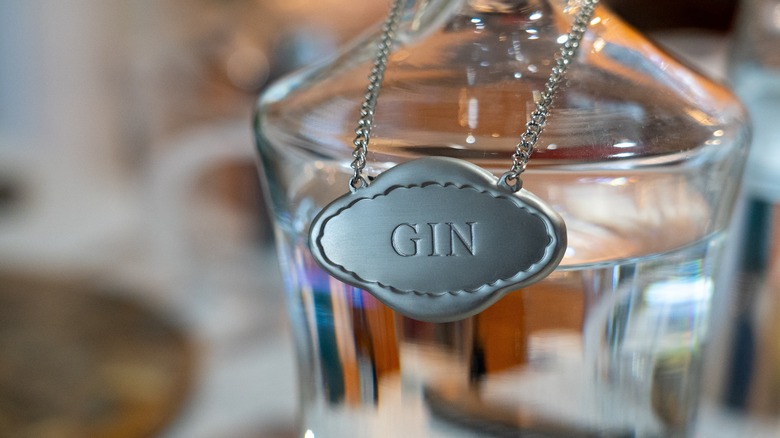 close up of glass bottle with gin label
