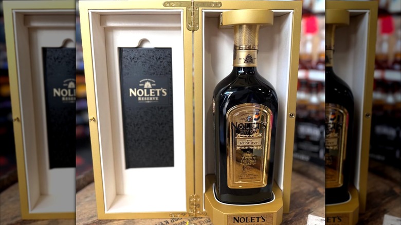 bottle of nolets reserve gin in branded case