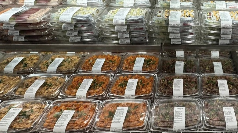 Variety of Kirkland Signature sushi rolls and poke bowls at Costco