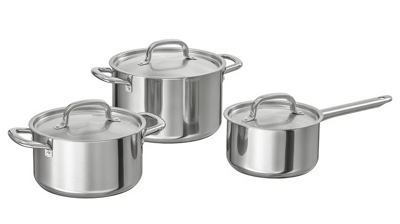 6 piece stainless steel set on white background