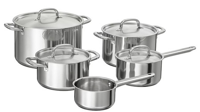 9-piece stainless steel set on white background