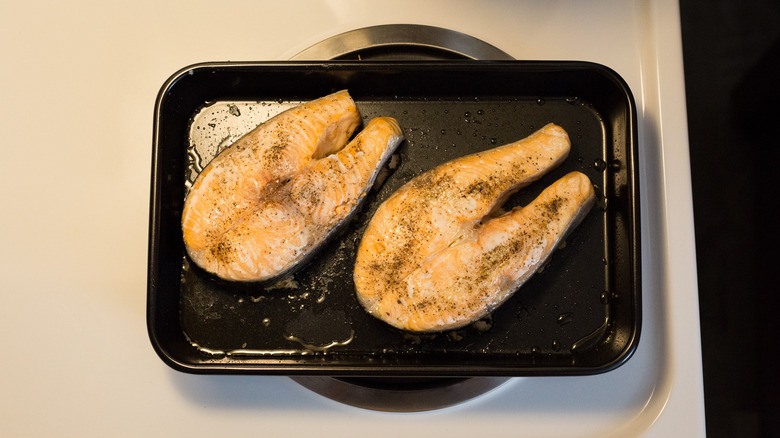 baked salmon steaks in pan