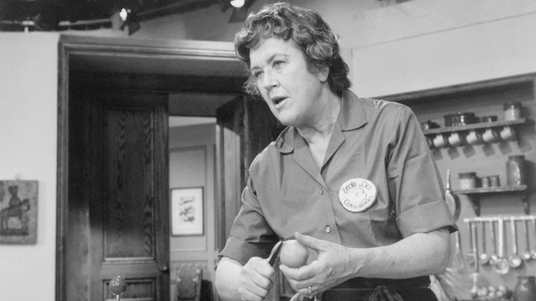Julia Child peeling an apple