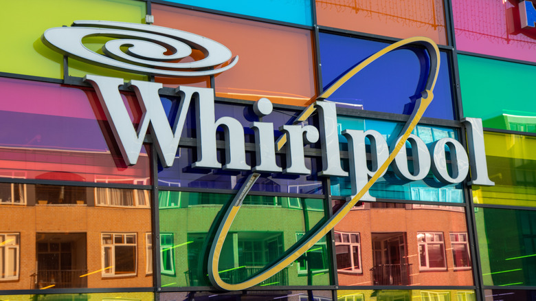 A colorful storefront with the Whirlpool company logo