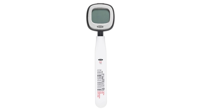 An Oxo Good Grips meat thermometer on a white background