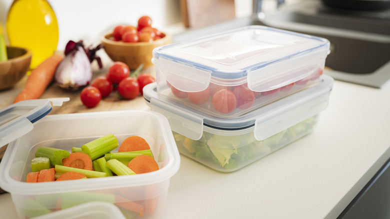 Plastic containers with vegetables