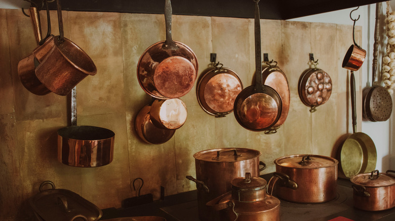 Copper cookware hanging in the kitchen