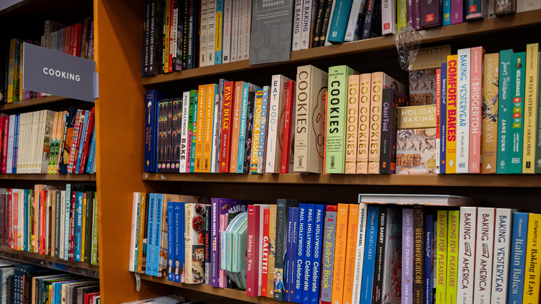 shelves of various cookbooks and baking cookbooks