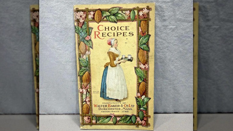 A copy of Walter Baker and Co. Choice Recipes standing against a grey background