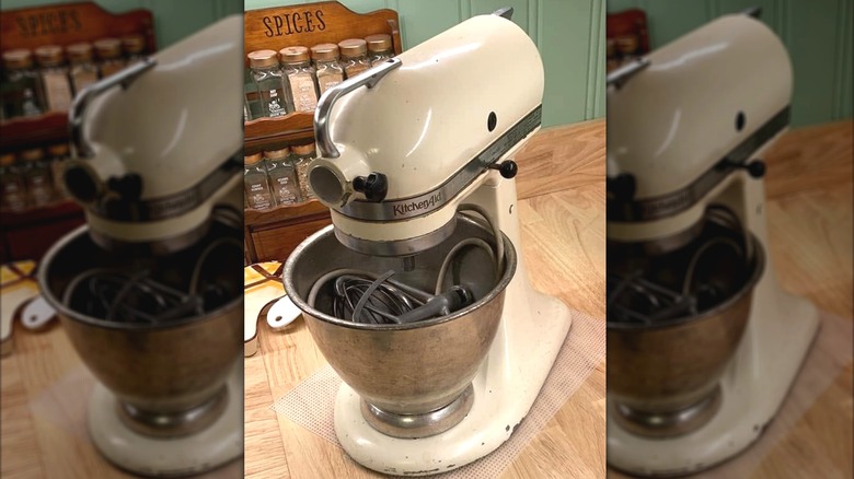 Antique Hobart Model K KitchenAid stand mixer on a countertop