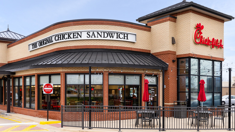 Front of a Chick-fil-A restaurant with outdoor seating