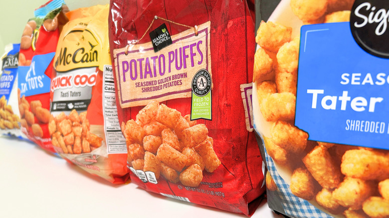 Close up of several frozen tater tot options arranged together