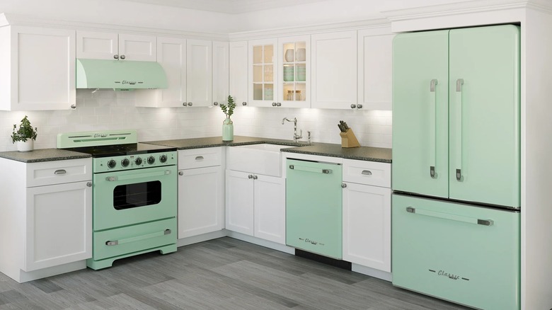 A suite of mint green vintage-style Unique kitchen appliances.